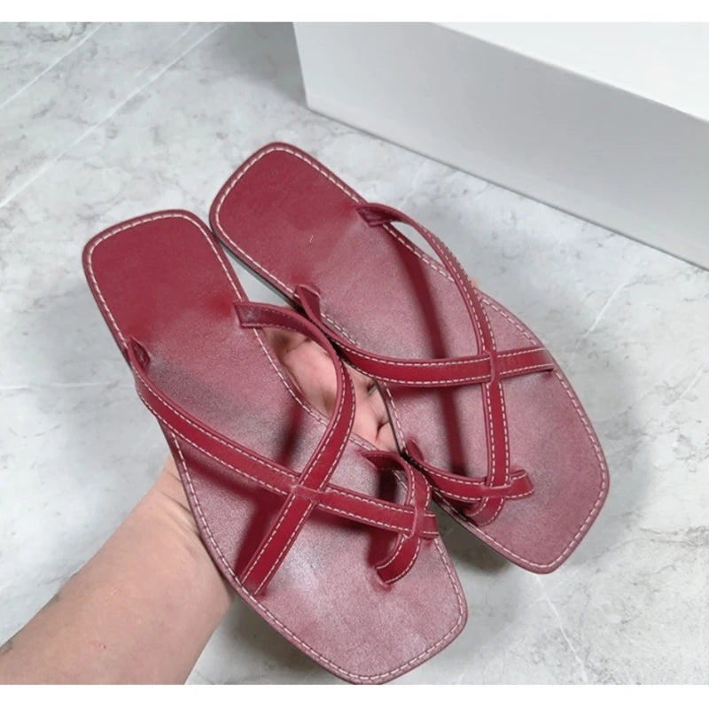 25 year niche women's genuine leather toe flip flops with retro cross straps and simple flat bottom sandals