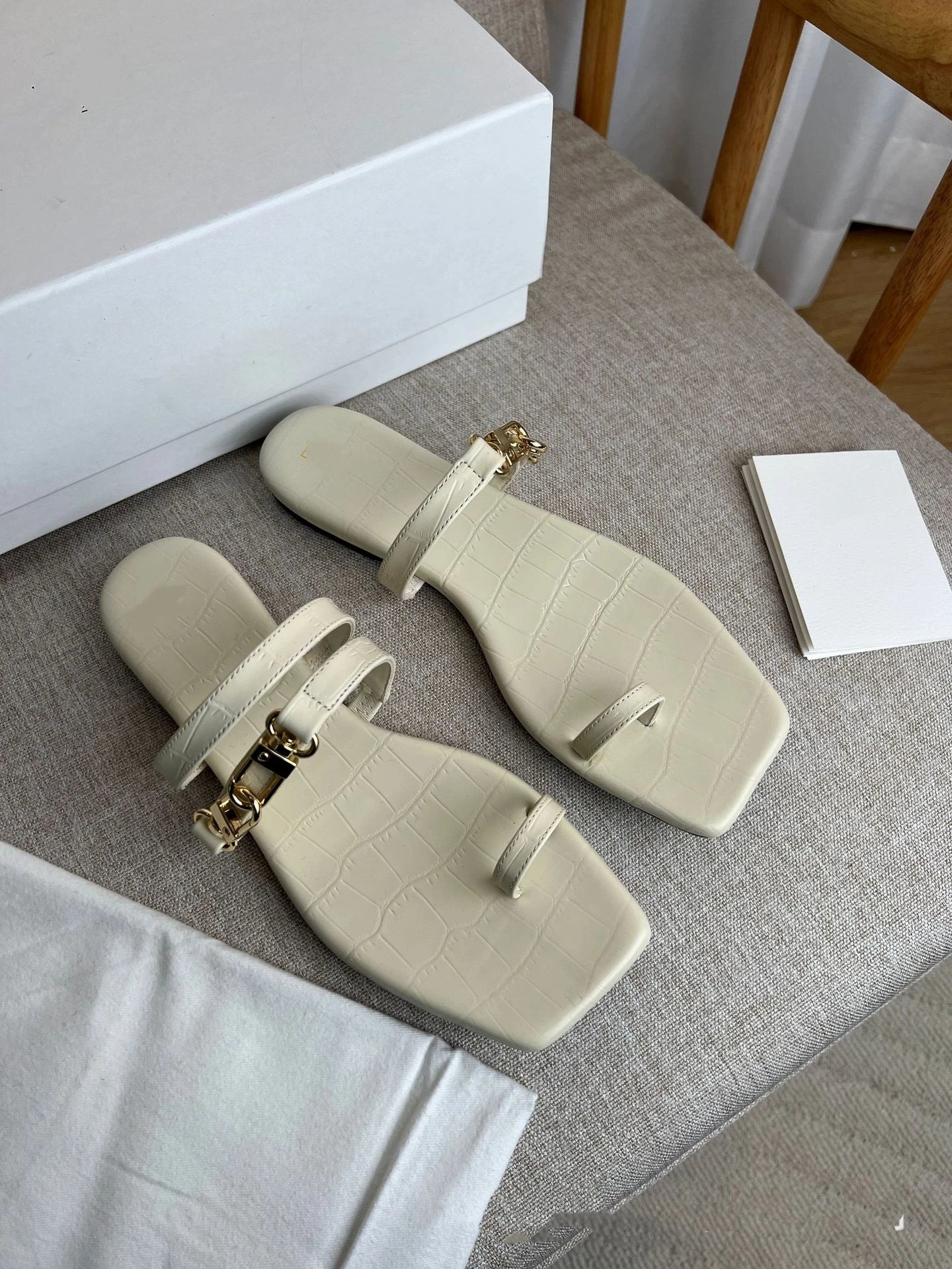 25 year summer genuine leather double gold buckle cover toe comfortable square head flat bottom straight strap M ü ller slippers