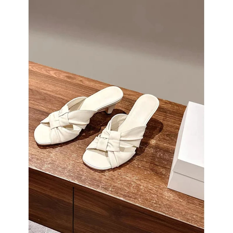 25 year old new leather woven flat bottomed women's French lazy beach flat bottomed straight sandals for casual wear