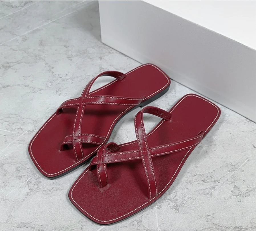 25 year niche women's genuine leather toe flip flops with retro cross straps and simple flat bottom sandals