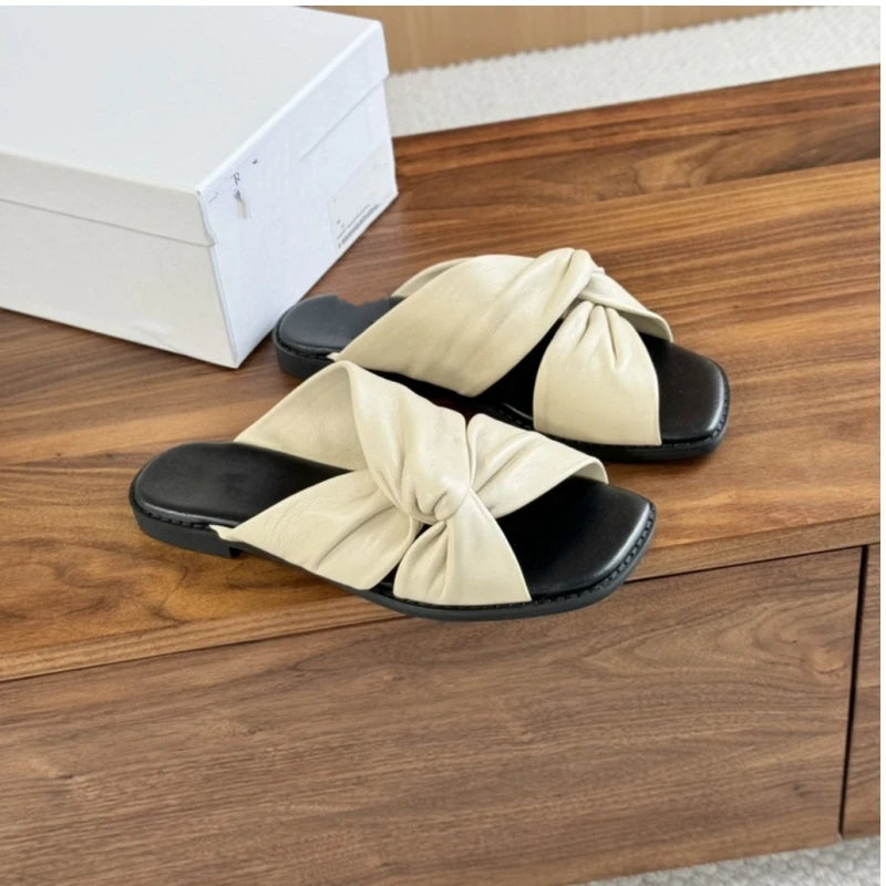 25 year summer genuine leather women's soft sheepskin flat bottomed open toe cross strap comfortable cloud slippers