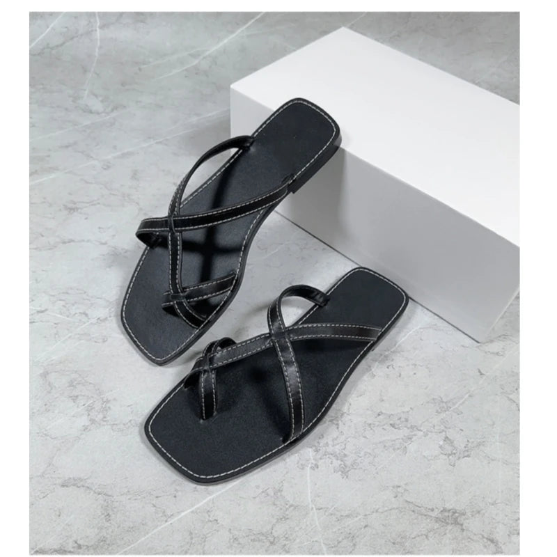 25 year niche women's genuine leather toe flip flops with retro cross straps and simple flat bottom sandals