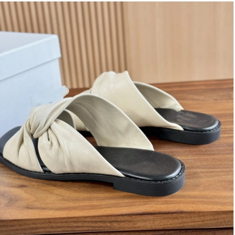 25 year summer genuine leather women's soft sheepskin flat bottomed open toe cross strap comfortable cloud slippers