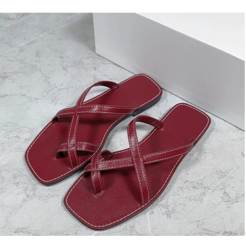 25 year niche women's genuine leather toe flip flops with retro cross straps and simple flat bottom sandals