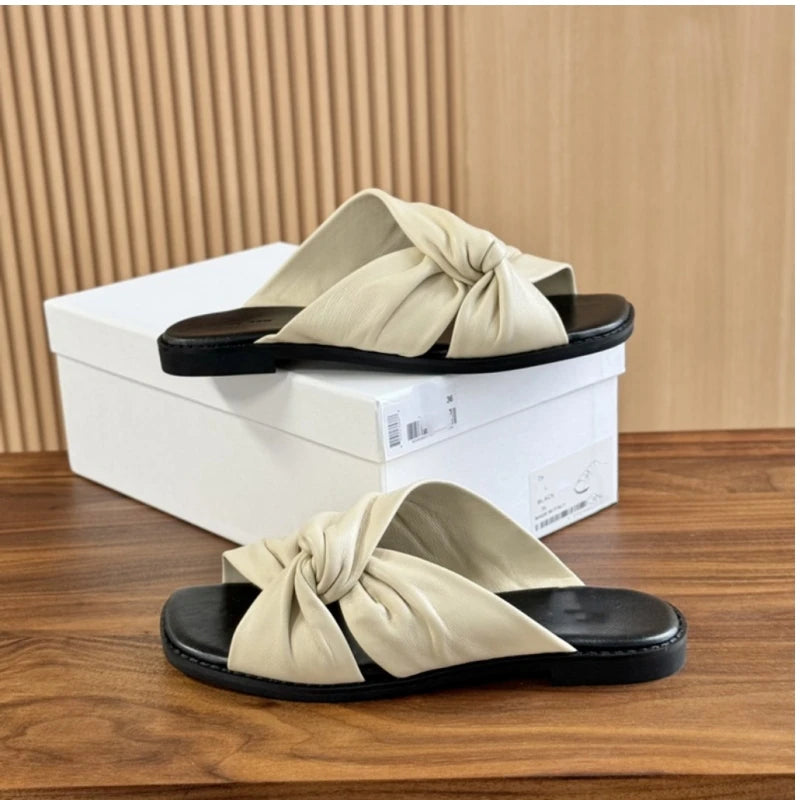 25 year summer genuine leather women's soft sheepskin flat bottomed open toe cross strap comfortable cloud slippers